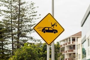 Road sign in Australia. Car accident. Traffic accident collision. Knock on. Pedestrian hit